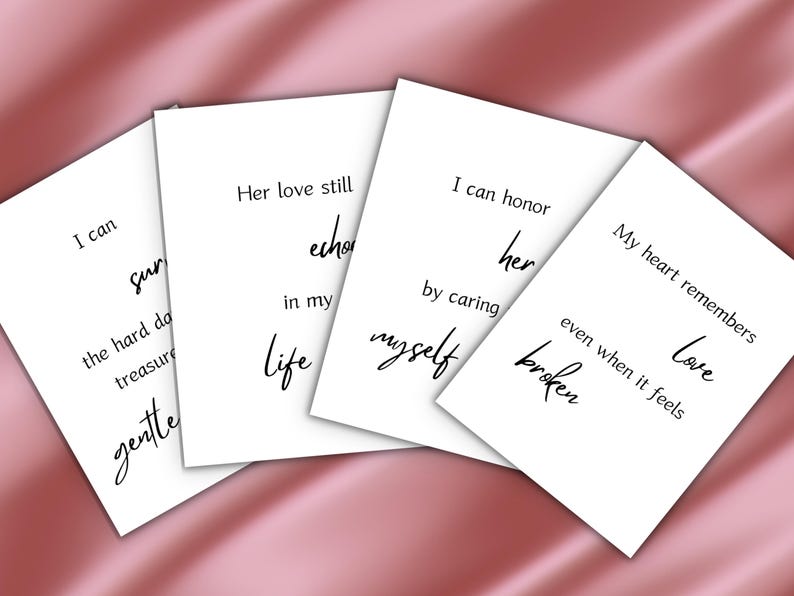 Four cards with verses including I can survive the hard days and my heart remembers love on pink satin