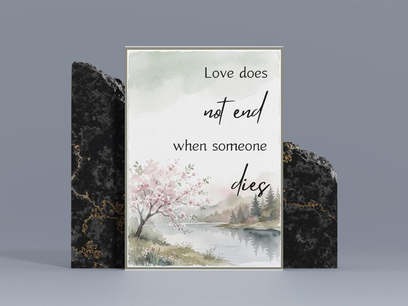 Framed print reading love does not end when someone dies with a pink flowering tree watercolor
