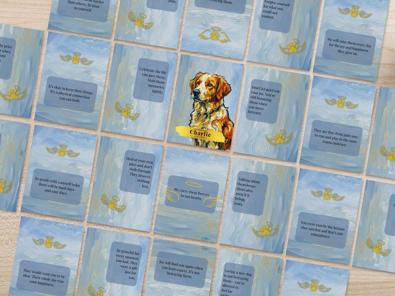 Angled flat lay showing the full 32 card dog loss affirmation set with custom portrait cover card
